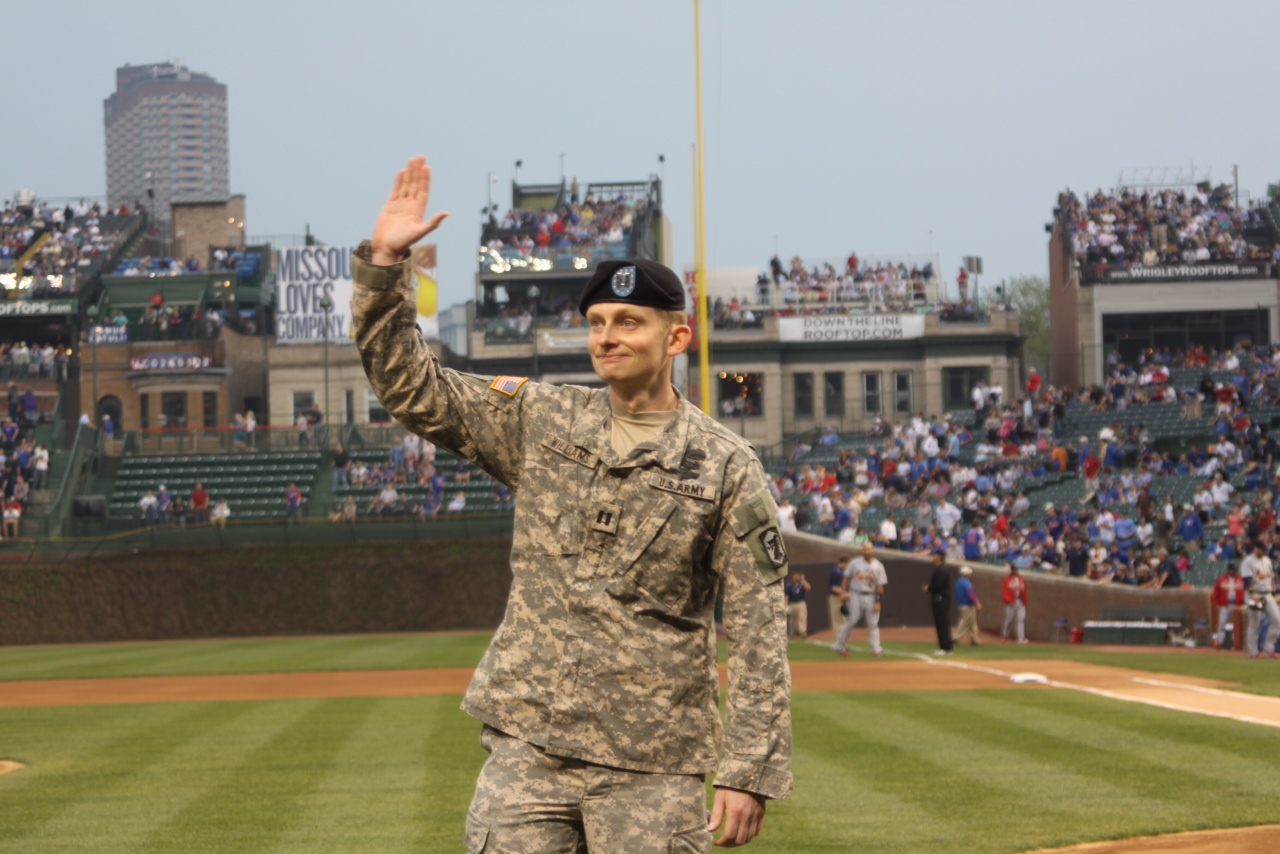 Sean Williams, Iraq veteran, waving at Wrigley Field
